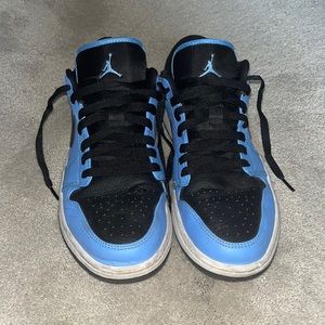 Black/blue Jordan 1 low. Size 8.5. Worn multiple times. Heavily discounted.
